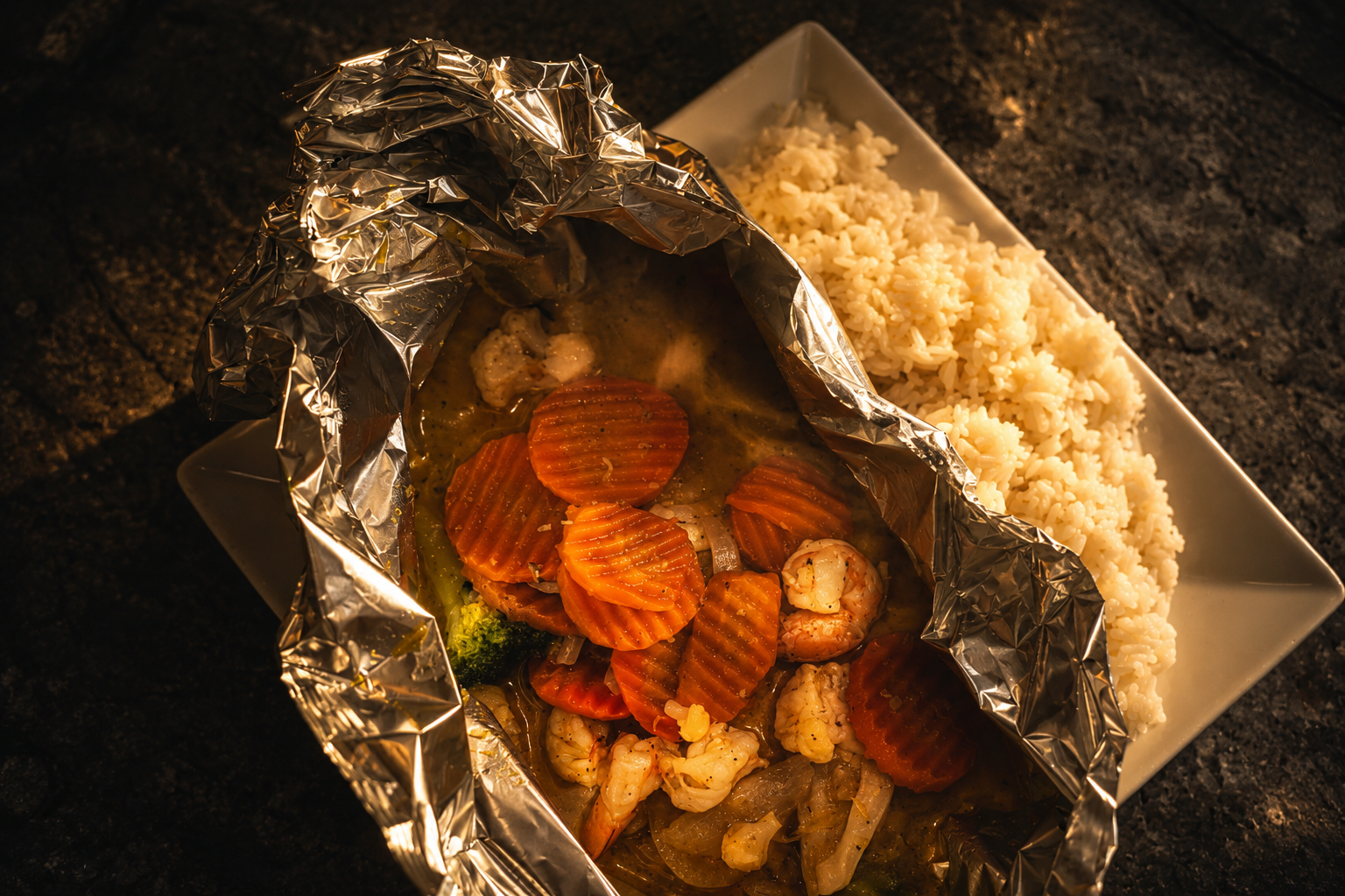 Foil-baked shrimp and vegetables with rice